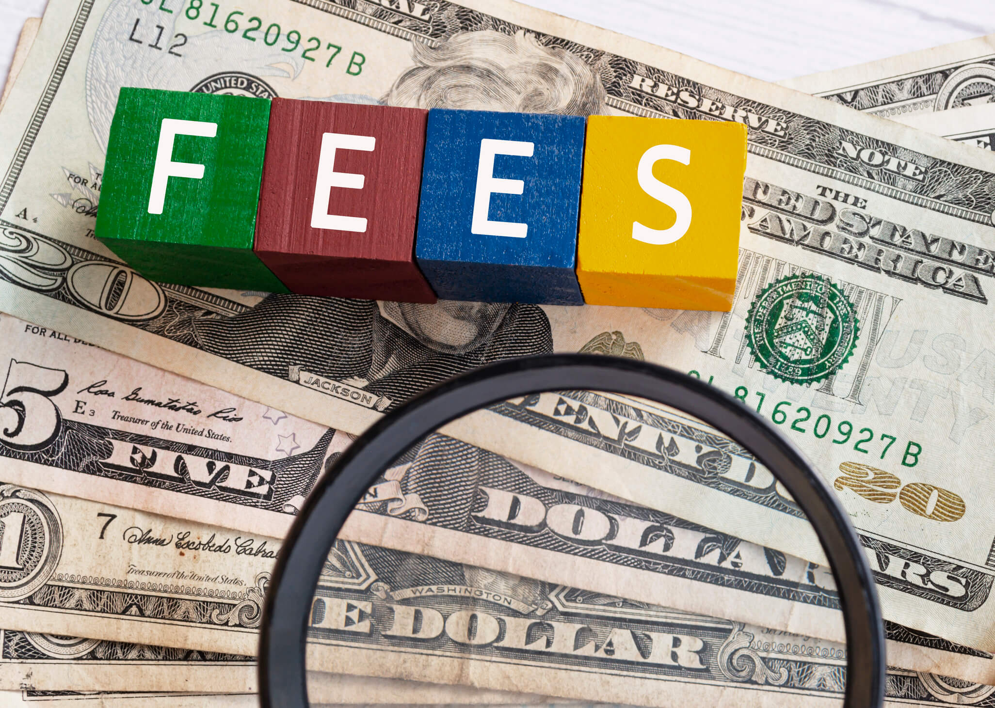 Money and fees concept with blocks