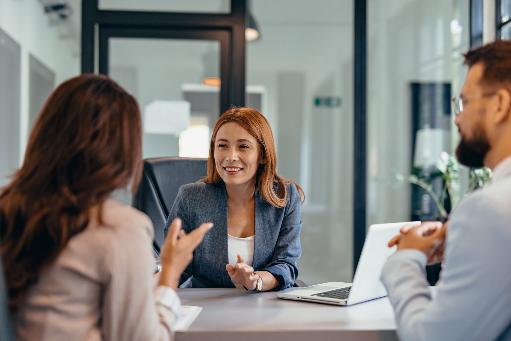 Colleagues talking in office